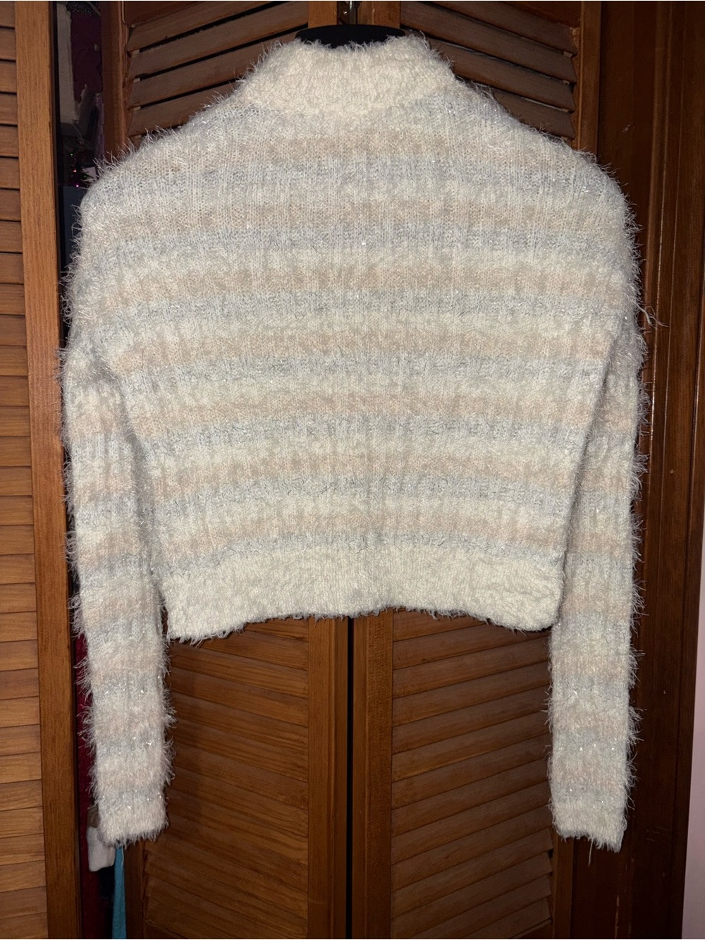 Candie’s fizzy shimmer sweater.